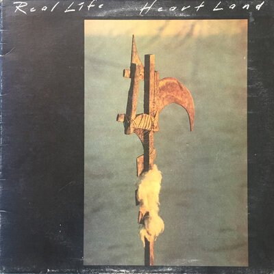 Real Life – Heart Land-lp-Tron Records